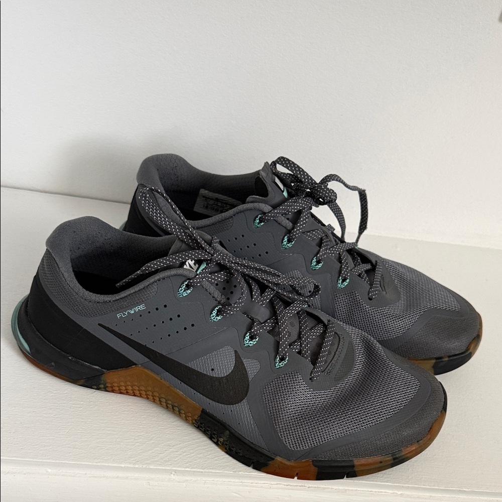 Nike Men's Gray Athletic Shoes with Black Swoosh and Brown Outsole